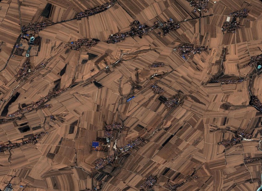 3月3日，“吉林一號”拍攝的梨樹縣國家百萬畝綠色食品原料（玉米）標準化生產基地核心示范區。（長光衛星供圖）